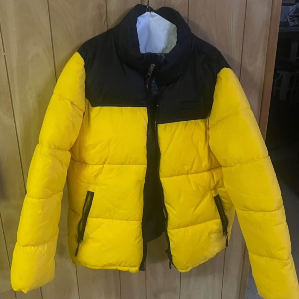 Red and Black Xl Puffer coat. Barely worn, fairly new. Passed return date to ret